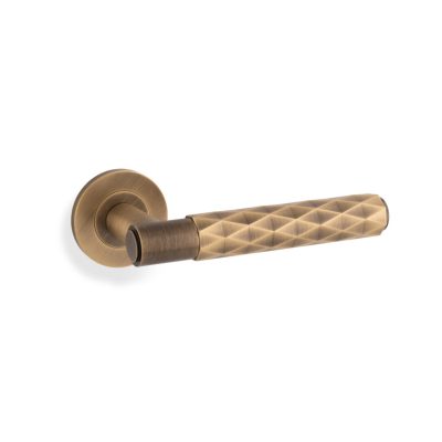 Diamond Cut Spitfire Lever on Round Rose Antique Brass